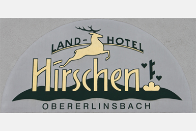 Akzente mit Gold im Firmenschild des Landhotels Hirschen in Erlinsbach